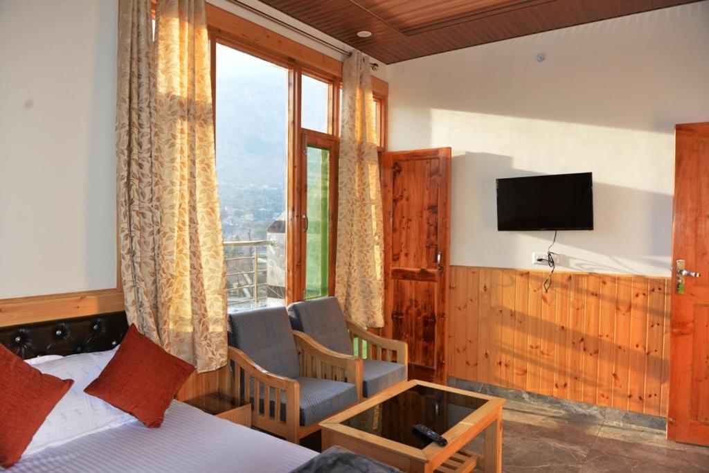 Tulip Flowing River View Hotel. Shamshi Bagian luar foto